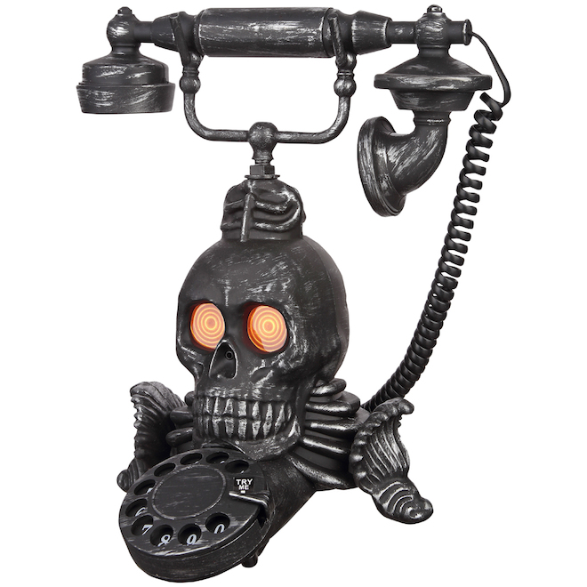Holiday Living Skull Telephone animated with lighted eyes