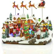 Village animé Carole Towne avec traîneau du Père Noël