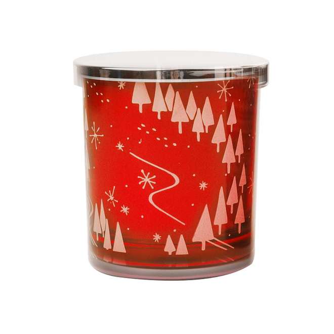 Bougie parfumée dans un bocal en verre Celebrations by L&CO, sapins rouges