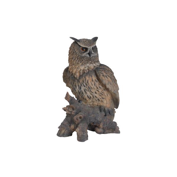 Statue de hibou royal sur une souche, multicolore