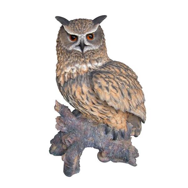 Statue de hibou royal sur une souche, multicolore