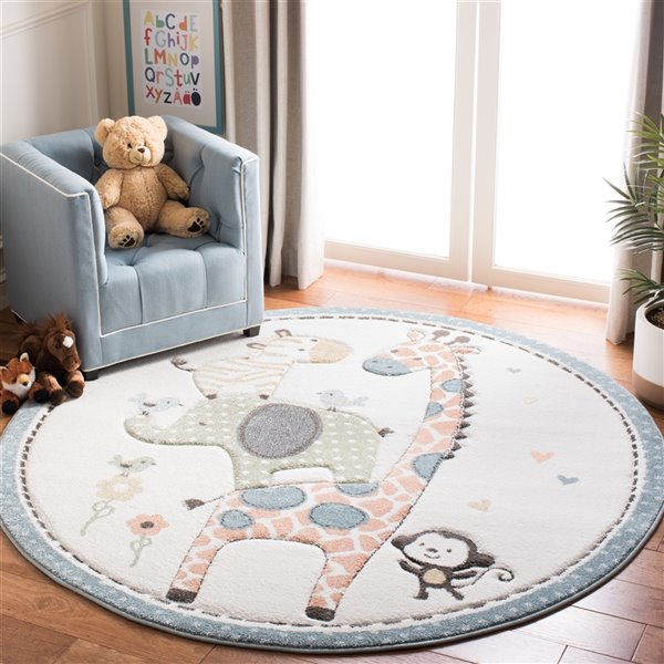 Tapis décoratif Carousel Kids CRK120A-5R de Safavieh, rond, 5 pi 3 po x 5 pi 3 po, ivoire