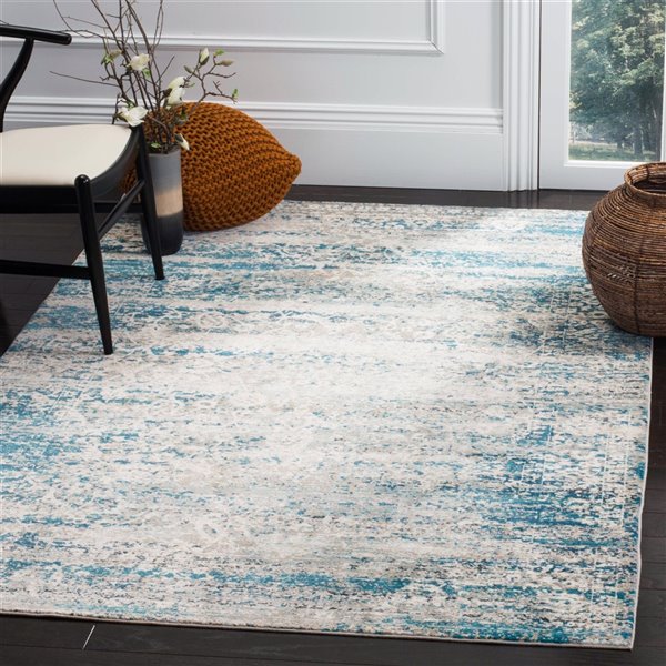 Tapis décoratif Aria ARA156B-5 de Safavieh, rectangulaire, 5 pi 1 po x 7 pi 6 po, bleu/crème