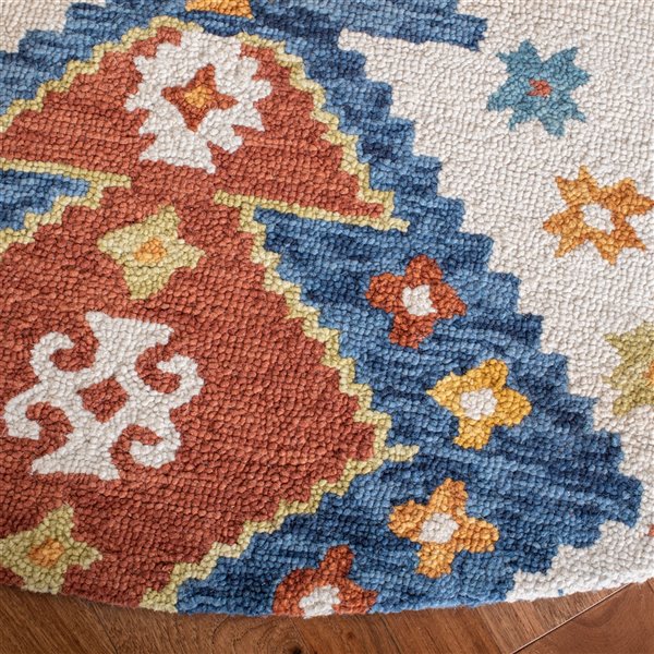 Tapis décoratif d'intérieur rond ivoire/bleu Aspen par Safavieh de style éclectique, 7 pi x 7 pi