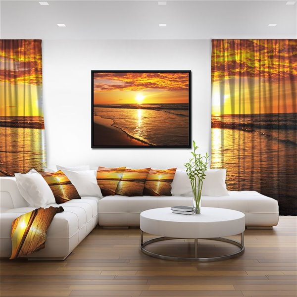 Designart Black Wood Framed 18-in x 34-in Bright Yellow Sunset over Waves Canvas Wall Panel