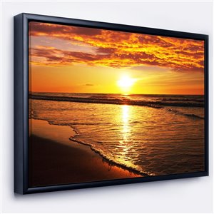 Designart Black Wood Framed 18-in x 34-in Bright Yellow Sunset over Waves Canvas Wall Panel