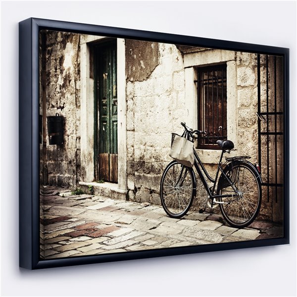 Designart 16-in x 32-in Bicycle with Shopping Bag Canvas Wall Panel with Black Wood Frame