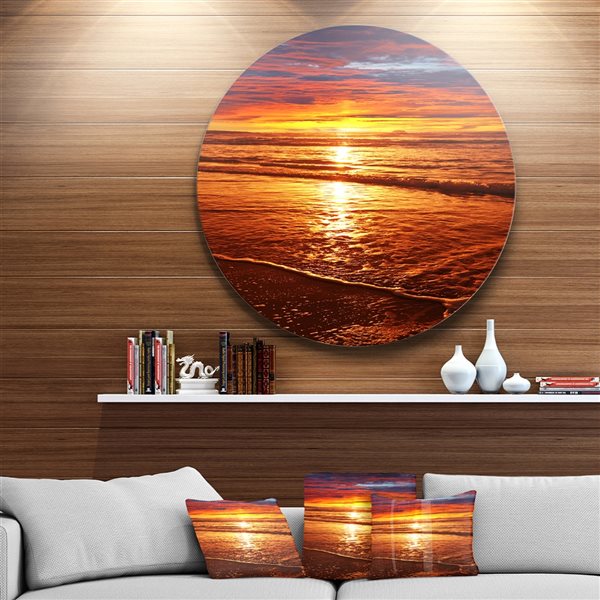 Designart 36-in x 36-in Round Colorful Sunset Mirrored in Waters' Beach Metal Circle Wall Art