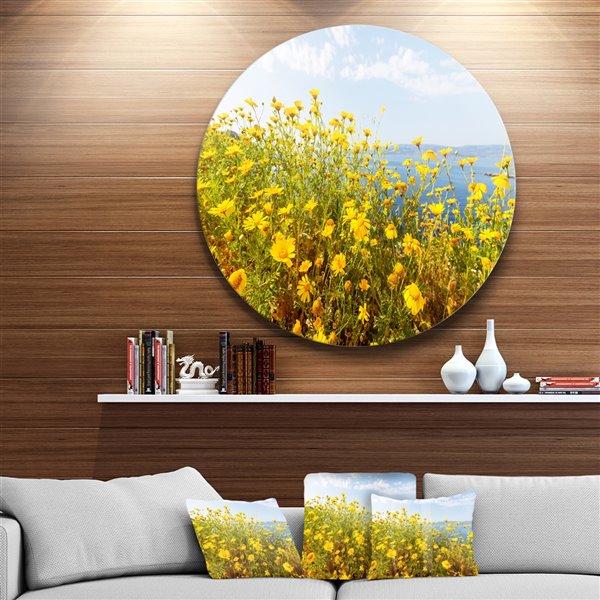 Designart 23-in x 23-in Little Yellow Flowers over Seashore Flower Metal Circle Art