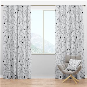 Designart Retro Geometric Grid III 84-in White and Black Polyester Blackout Standard Lined Single Curtain Panel