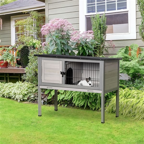 Elevated rabbit clearance hutch