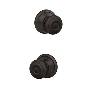 Schlage F Series Georgian Aged Bronze No Deadbolt Passage Door Knob