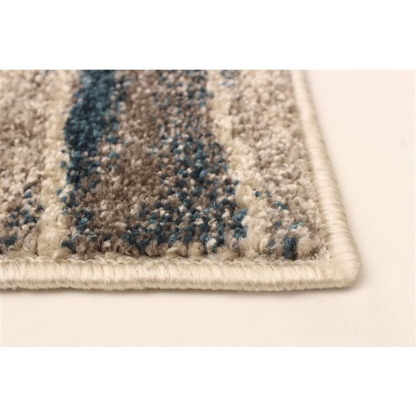 Tapis Neela par ECARPET rectangulaire ivoire et bleu de 6,5 pi x 9,5 pi