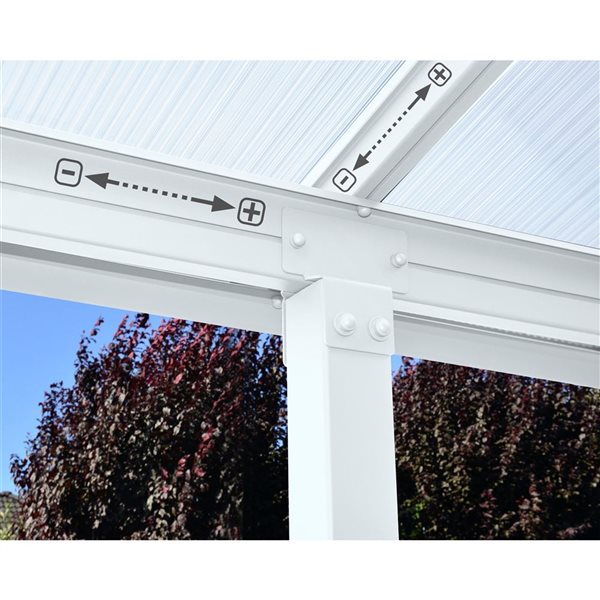 Abri pour patio 10 x 20 pi Olympia de Canopia cadre aluminium blanc et panneaux polycarbonate transparent