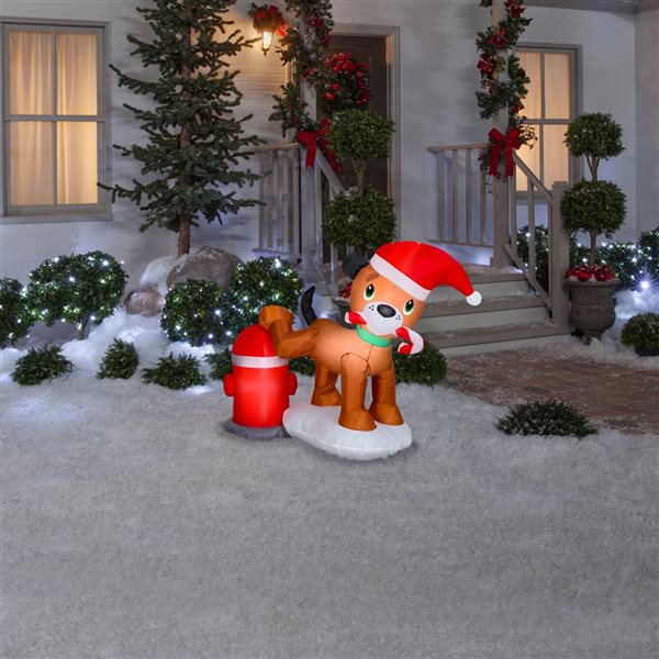 Gemmy 38 L x 48-in H LED Lighted Tinkle Tidings with Puppy and Fire Hydrant Christmas Inflatable