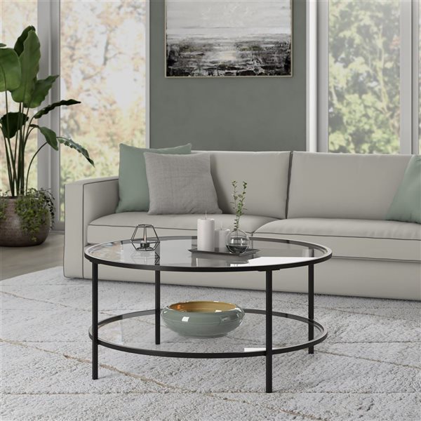 Table basse ronde Sivil de Hailey Home noir avec surface en verre