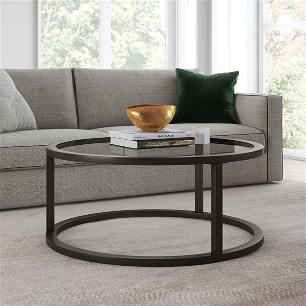 Table basse ronde Parker de Hailey Home noir avec surface en verre