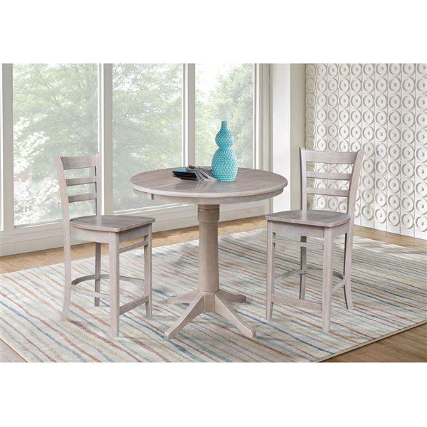 International Concepts 36-in Round Extension Wood Dining Table w/ 2 Emily Counter Height Stools - Washed Grey Taupe