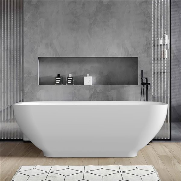 Rainlex 67x29.5x21.6-in Freestanding Solid Surface Oval Soaking Bathtub w/ Matte White Pop-Up Drain - White